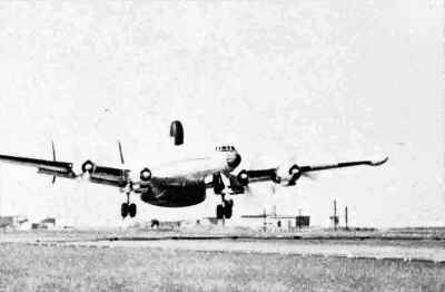 Tango Echo One lifts its 140,000 pounds off the runway at NAS Sangley Point, Philippines.