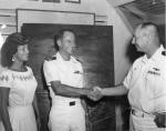 Bud Horn, congradulated by VW-1 CO Cdr. Ralph Dannettell, Jr., USN