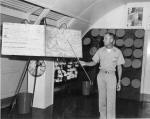 Bud Horn, congradulated by VW-1 CO Cdr. Ralph Dannettell, Jr., USN
