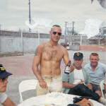 Gary Oulman at Sangley Point, cuts his birthday cake 