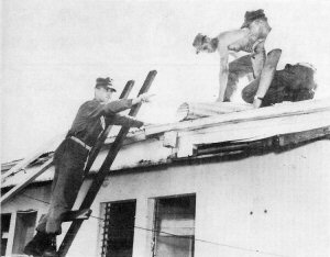 PIONEERS BUILD new roofs for the nunnery, chapel and main auditorium of the Church and School of St. Francis in Yona.