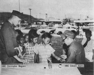 17 U.S. Navy Corpsmen with the 3rd Battalion, 4th Marines, were flown to Guam from Hawaii to assist in the Typhoon Karen recovery program, to administer typhoid vaccine to the Guamanian population throughout the villages.