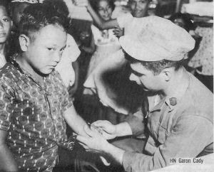 17 U.S. Navy Corpsmen with the 3rd Battalion, 4th Marines, were flown to Guam from Hawaii to assist in the Typhoon Karen recovery program, to administer typhoid vaccine to the Guamanian population throughout the villages.
