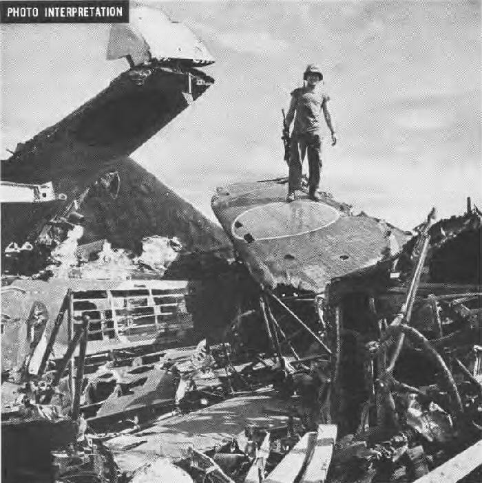 U.S. Marine on wrecked Zero