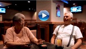 Sally Metzger and Norbert Monohan swapping stories